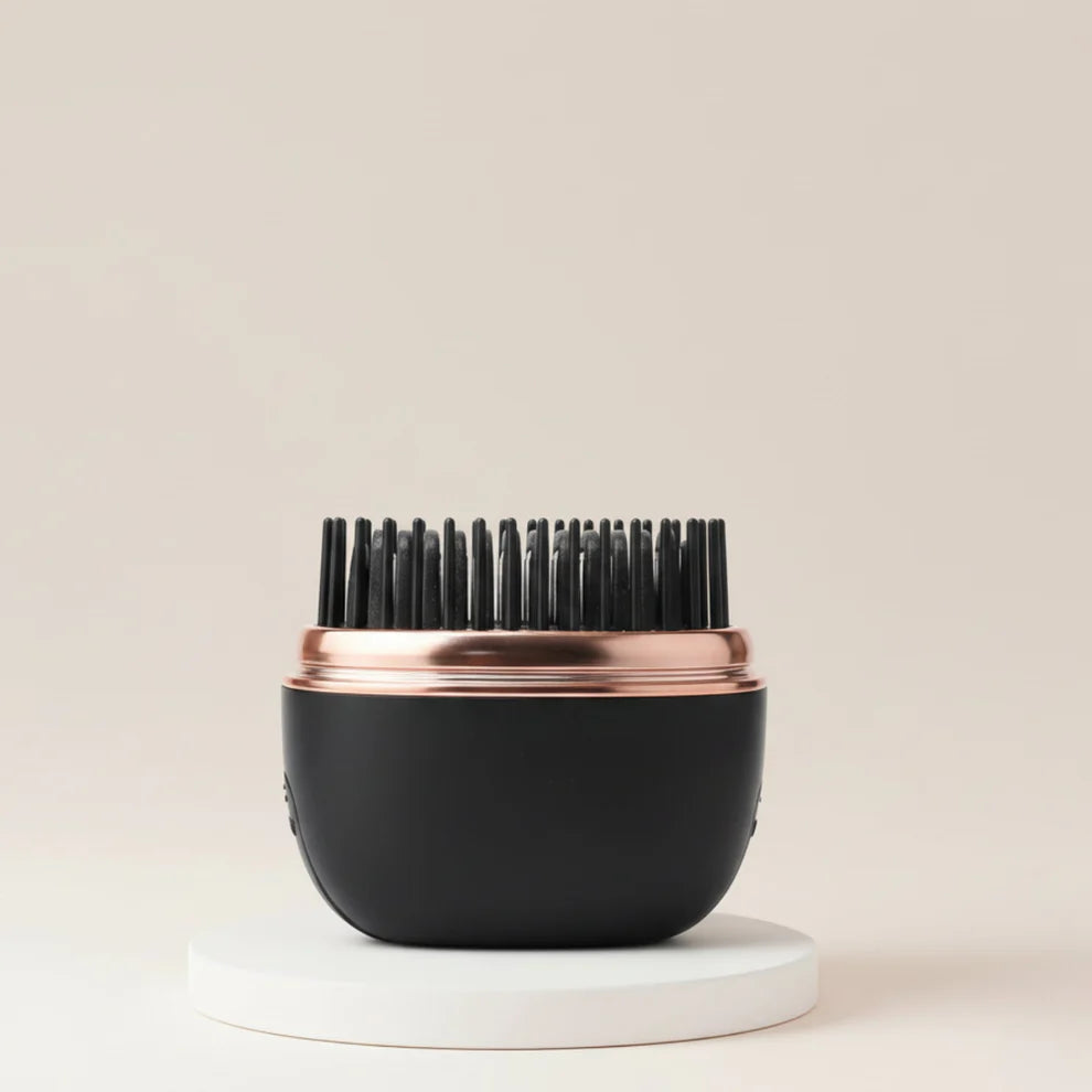The Harmoniq Mini Pocket-Sized Cordless Heated Brush