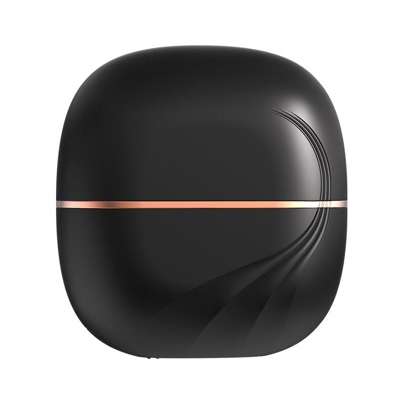 The Harmoniq Mini Pocket-Sized Cordless Heated Brush