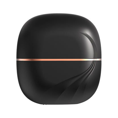 The Harmoniq Mini Pocket-Sized Cordless Heated Brush